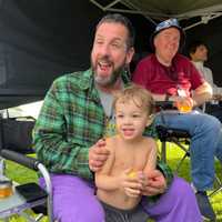 <p>Bruce Golomb with Adam Sandler on the set of "Happy Gilmore 2"</p>