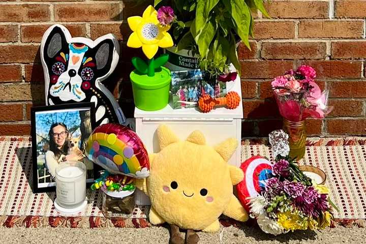Animal Hospital Sets Up Memorial For Vet With 'Rockstar Smile' After Double Murder-Suicide