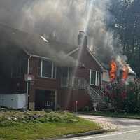 2 Firefighters Injured, Cat Rescued From West Milford Blaze: Officials