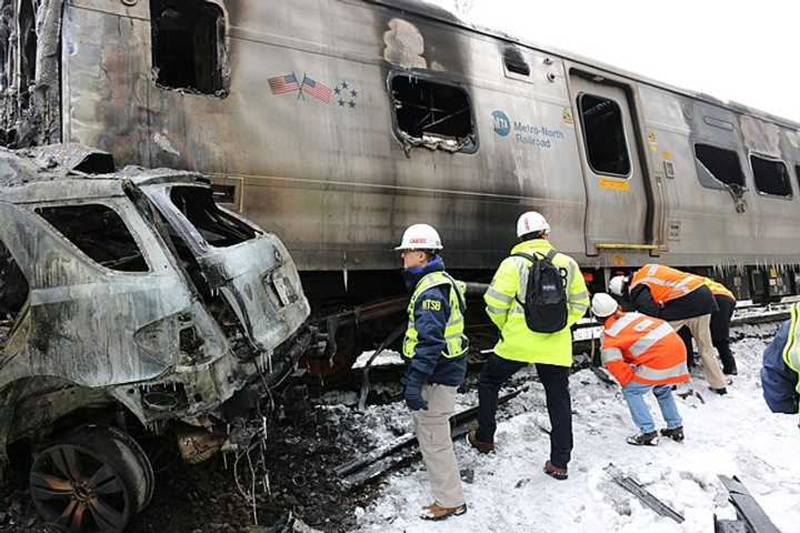 The train car and SUV involved in the Valhalla crash.