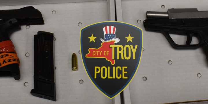 The two loaded pistols Troy police said they found in a car with five underage boys.&nbsp;