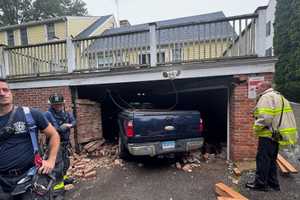Driver Suffering Medical Emergency Crashes Into Norwalk Home, Knocks Out Support Structures