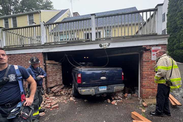 Driver Suffering Medical Emergency Crashes Into Norwalk Home, Knocks Out Support Structures