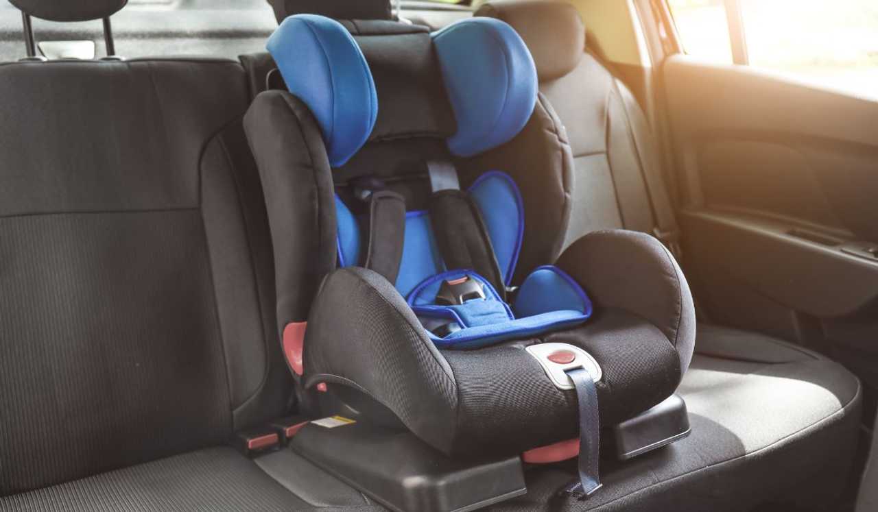 A child's car seat. A child's car seat.