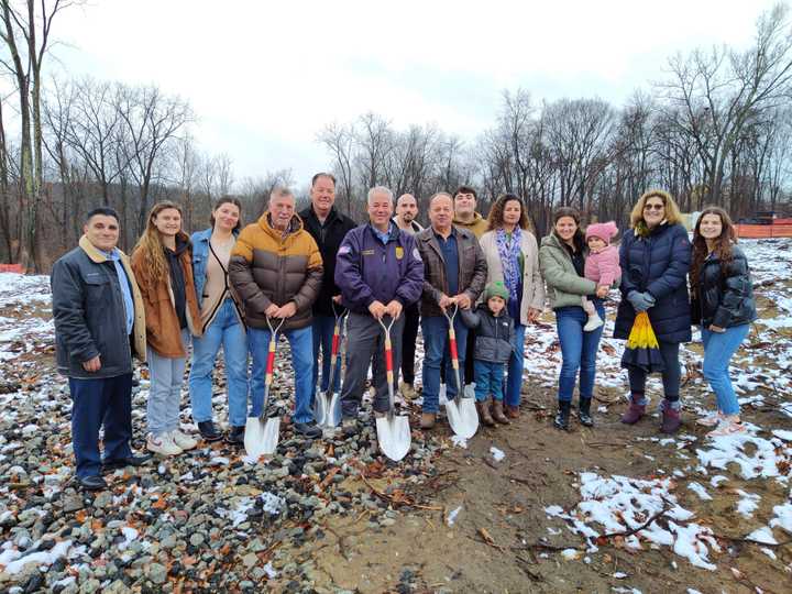 Atlantic Appliance owner Joey Vukaj stands with his family and members of the Yorktown Town Board on Friday, Nov. 22 at the site of Vukaj's future store.
  
