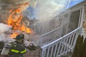 Norwalk Firefighters Save Home from Spreading Blaze in Minutes