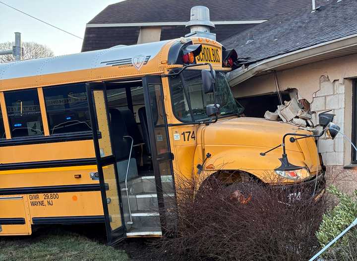 Photos of the crashed bus in Wayne.