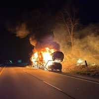 <p>Flames lit up the pre-dawn sky in Plainfield on Saturday, April 26, after a car carrier caught fire on I-395.&nbsp;</p>