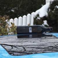 <p>A bottle of what appears to be John Walker &amp; Sons liquor was captured on top of the vehicle.</p>