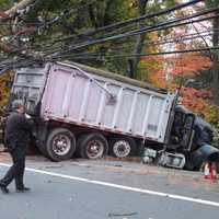 Dump Truck Crashes Into Utility Pole In Hawthorne