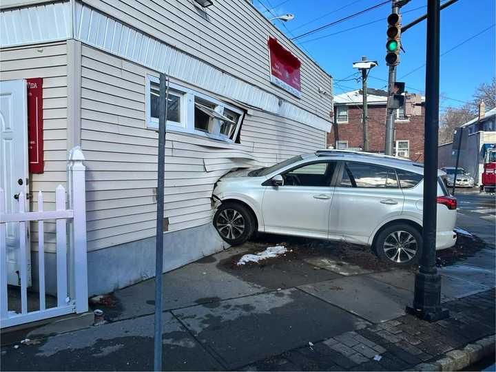 Firefighters were called to the intersection of Lafayette Place and Englewood Avenue after a car crashed through a church Saturday morning, Dec. 21. 