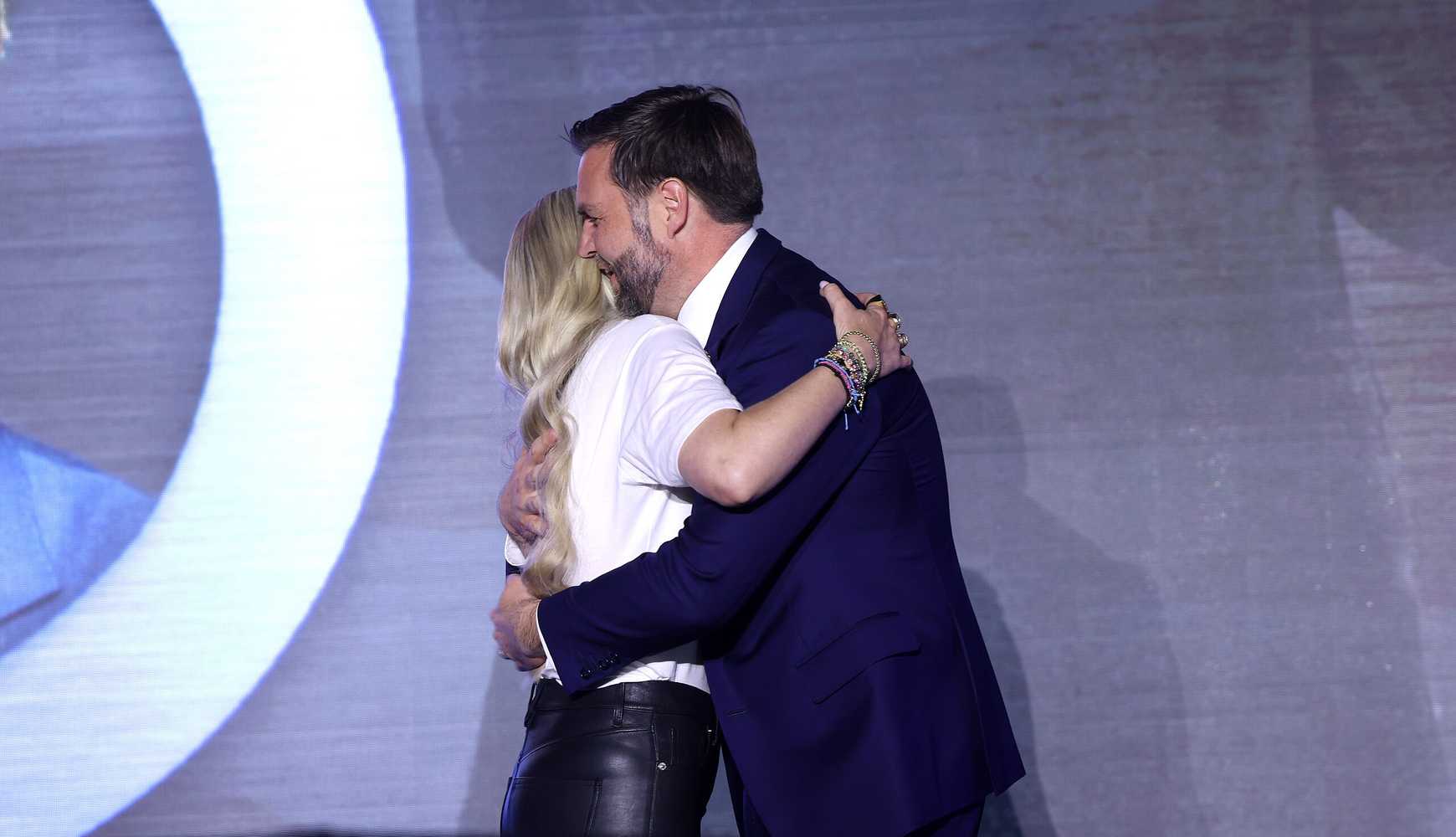 
Turning Point USA CEO Erika Kirk hugging Vice President JD Vance during an event at the University of Mississippi on October 29, 2025.
  

