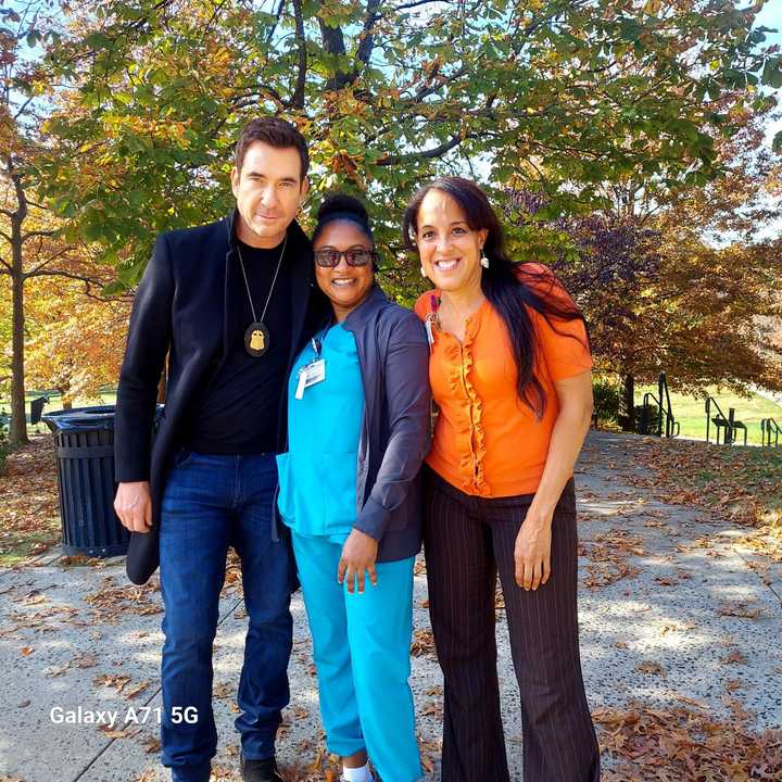 "FBI: Most Wanted" star Dylan McDermott poses with Wartburg employees, Nathalie Murray and Yaneika Olivo. 