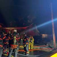 <p>Firefighters at the scene of the house fire in Ephrata.</p>