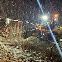 <p>The snow plow truck being removed </p>