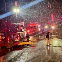 <p>Fire crews at the scene of the snow plow rollover.</p>