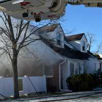 <p>Smoke billowing from the home.</p>