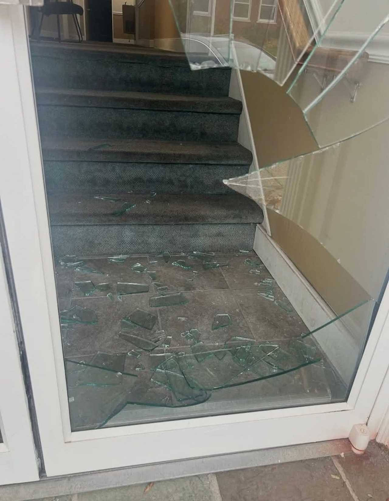 The Delaware County GOP Office's front door shattered by a vandal.