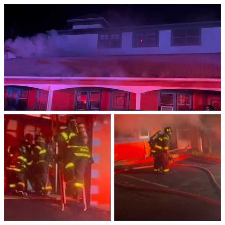 Firefighters battle a blaze at the Garden Park Motel on Westport Avenue in Norwalk around 2:30 a.m. Friday, Jan. 3. 