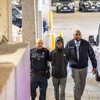 <p>Montay Brown being perp walked</p>