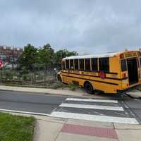 School Bus Lands In Community Garden After Crash With SUV In Silver Spring