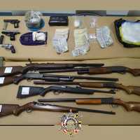 <p>The guns and other items seized during the bust in St. Mary's County.</p>