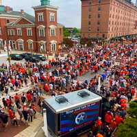 <p>Orioles' fans filing toward the field amid the fire in Baltiore.</p>