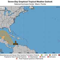 <p>A look at the system in the Western Caribbean which could become a tropical depression around the middle part of the week, the National Hurricane Center said.
  
</p>