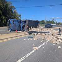 Traffic Slowed After Overturned Truck Spills Debris Into Busy Montgomery County Roadway