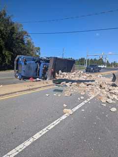 Traffic Slowed After Overturned Truck Spills Debris Into Busy Montgomery County Roadway