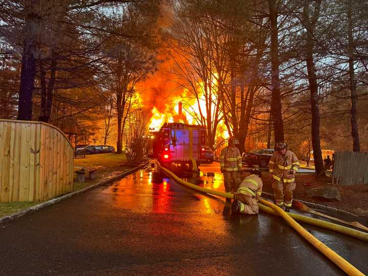 Georgetown firefighters battle a blaze in Weston on Thanksgiving.&nbsp;