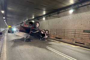 Overturned Dump Truck Clogs Fort McHenry Tunnel, Spills Gravel On I-95