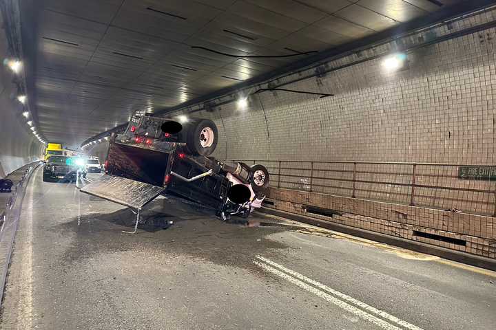 Overturned Dump Truck Clogs Fort McHenry Tunnel, Spills Gravel On I-95