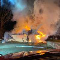 Blaze Destroys Abandoned Calverton Liquor Store Possibly Used By Squatters: Officials