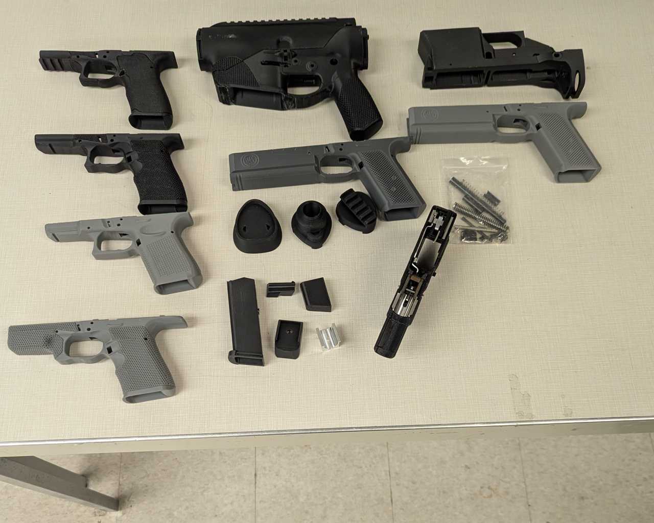 Tyler Schmalenberger was arrested after investigators found multiple 3D-printed gun parts inside his Port Jefferson home, police say. Tyler Schmalenberger was arrested after investigators found multiple 3D-printed gun parts inside his Port Jefferson home, police say.