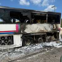Tour Bus Erupts In Flames At Montgomery County Park-And-Ride, Sending One To Hospital
