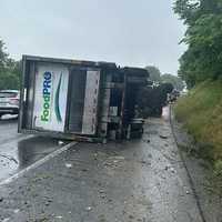 <p>The overturned tractor-trailer.</p>