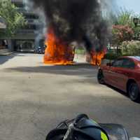Amazon Van Goes Up In Flames On Arlington Roadway; No Packages Damaged, Officials Say
