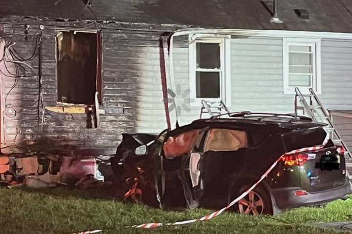 Gas-Fed Fire Displaces 14 After Car Crashes Into Montgomery County Home (PHOTOS)