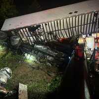Tractor-Trailer Teeters Off Beltway Bridge In Early Morning Crash In Maryland (PHOTOS)