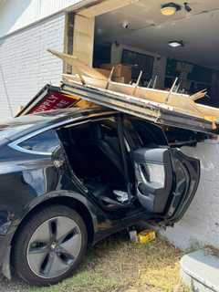 Tesla Driver Wrecks DC Gas Station Wall, Triggers Emergency Response (PHOTOS)