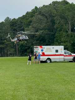Boater Hoisted From Chesapeake Bay By Maryland State Police After Vessel Overturns (WATCH)
