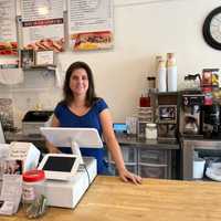 <p>Cavagliato behind the counter at Sol's Cafe, which she opened in 2010 after taking over for Tony's Deli, where she'd worked for several years.</p>