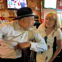 <p>Dr. James Pruden and Liz Clement at The Cottage Bar for one last drink on Tuesday, July 30.</p>