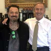 <p>Brandon "Bam" Margera with his attorney, Michael T. van der Veen, on Monday, Sept. 23.</p>