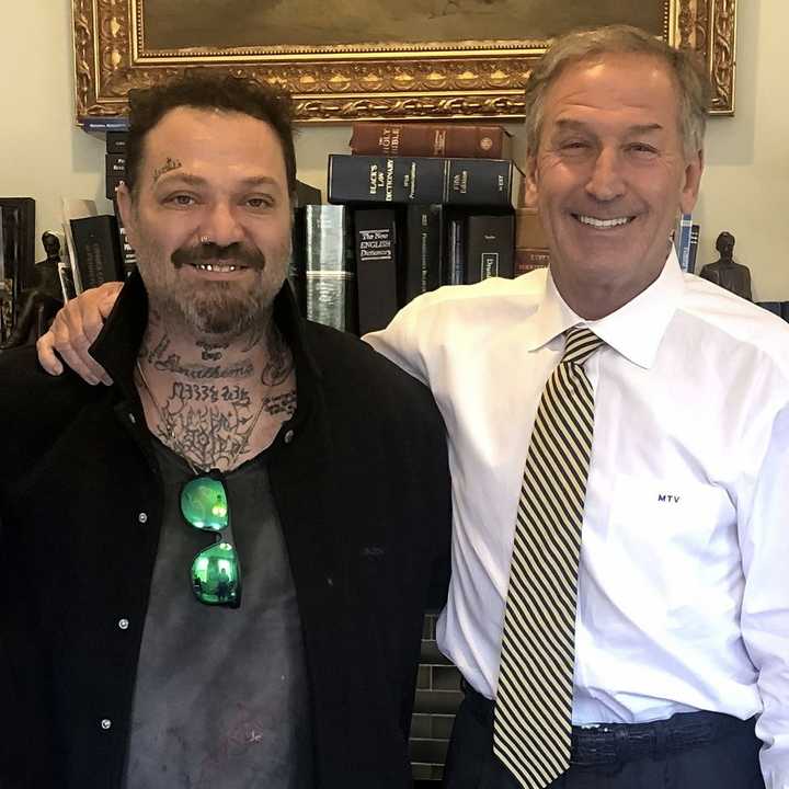 Brandon "Bam" Margera with his attorney, Michael T. van der Veen, on Monday, Sept. 23.