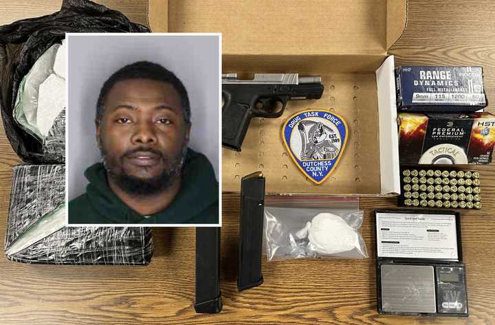 Rahmel P. Garraway and the drugs and gun seized.&nbsp;