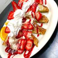 <p>"Best place I ever ate," said Angelo, a Readers' Choice voter. "The people are great and warm. Service is very good."</p>