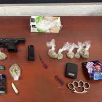 ‘Multiple Criminal Indicators’ Lead To Gun, Drug Bust On I-695: State Police