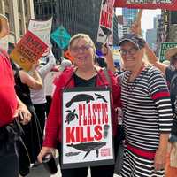 <p>Camilla Calhoun (in stripes) with Judith Enck at a NYC rally in 2024.</p>